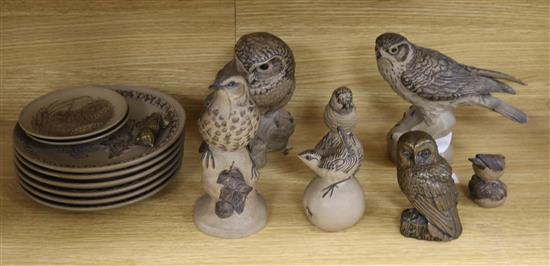 A collection of Poole pottery bird related models and plates and a Ken Norris resin owl